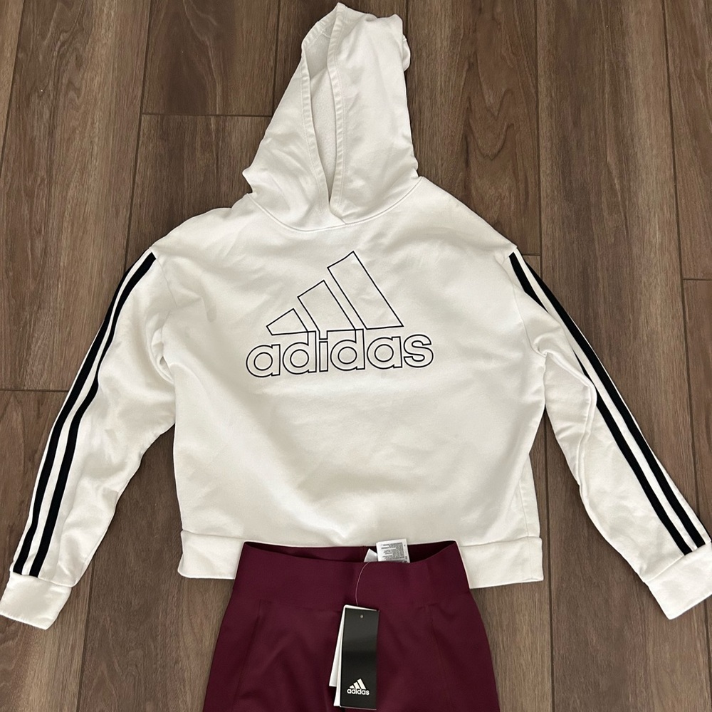 Adidas volleyball shorts and long sleeve hoodie.